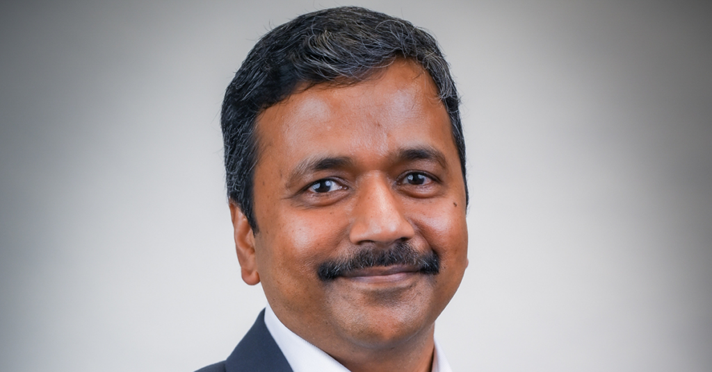 professional headshot of Maneet Singh
